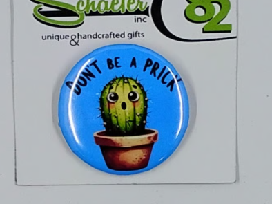 Handcrafted small pin with the image of a cactus and the saying dont be a prick