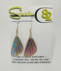 Handcrafted fabric butterfly wings with the colors of pink, purple, and blue with gold accents