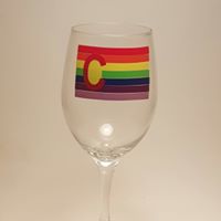 Handcrafted wine glass with the rainbow pride flag, made to resemble the Colorado flag.