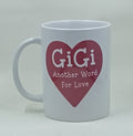 Handcrafted coffee mug with a red heart that says Gigi another word for love.