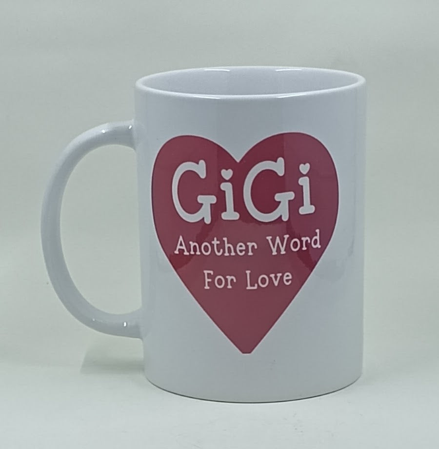 Handcrafted coffee mug with a red heart that says Gigi another word for love.