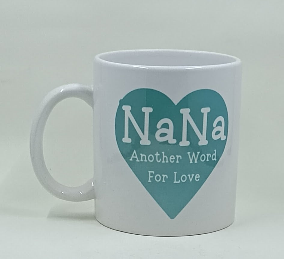 Handcrafted white mug with a teal heart that says "Nana, another word for love"