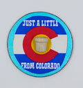 Hancrrafted Colorado flag magnet that says just a little pot from Colorado.
