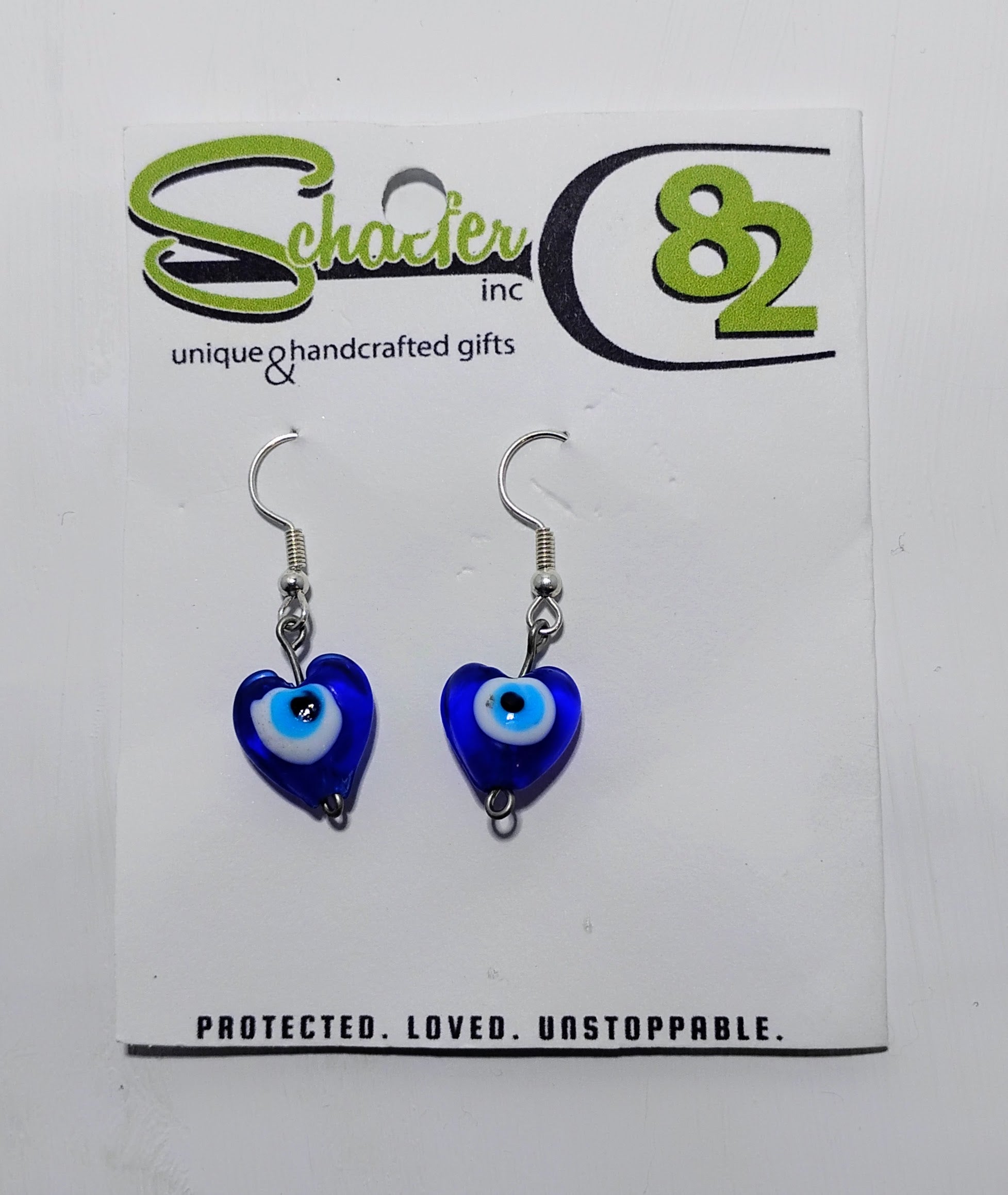 Handcrafted Evil Eye earrings that are made with hearts.
