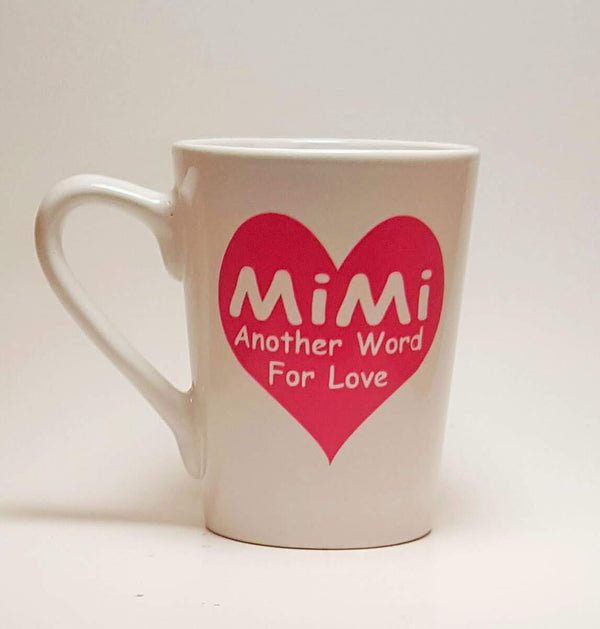 Handcrafted coffee mug with a large heart and the quote "MiMi, another word for love".