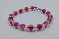 Handcrafted pink, yellow and clear beaded bracelet