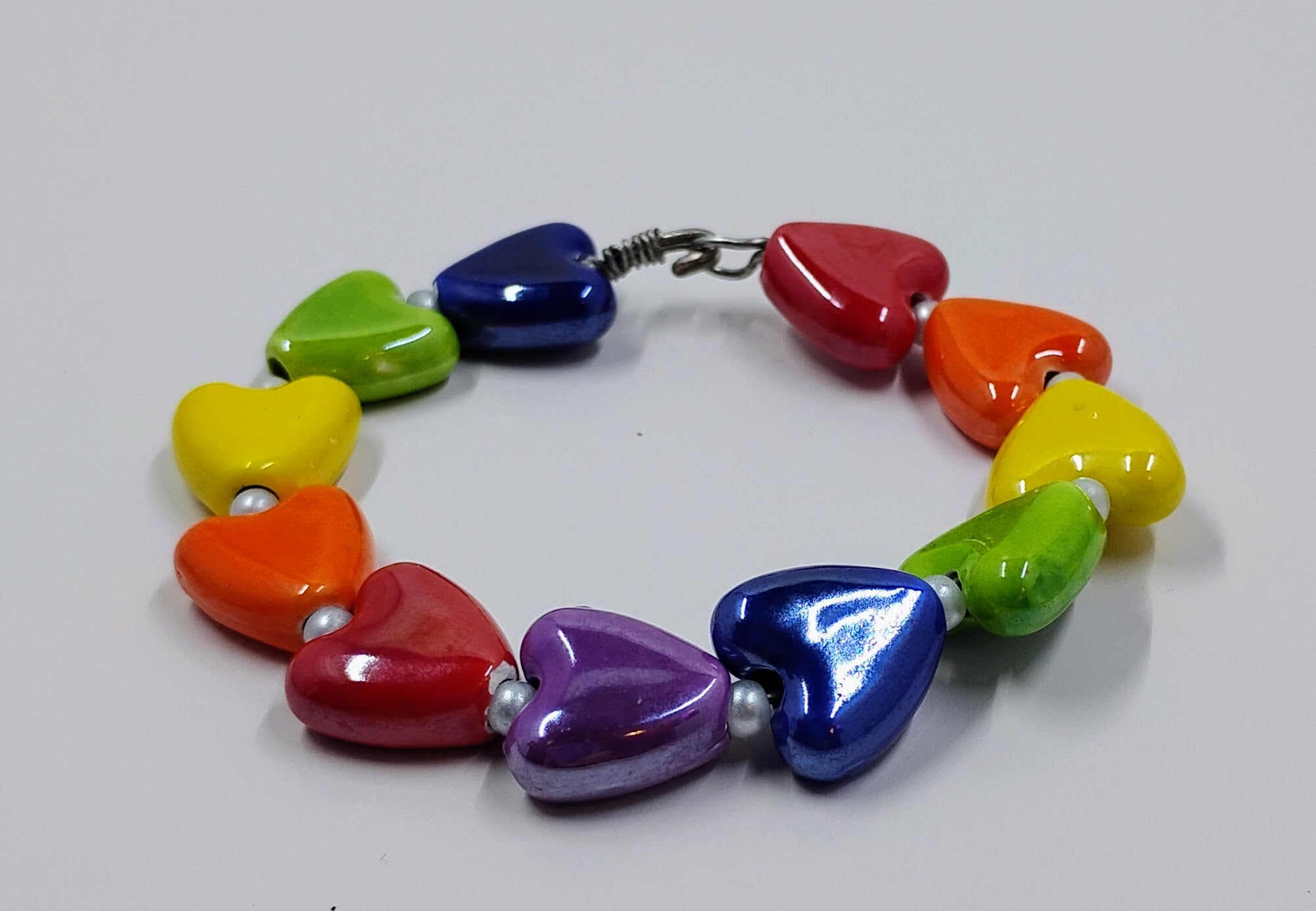 Handcrafted rainbow heart beaded bracelet