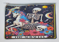 Handcrafted tarot inspired zipper bag with a skeleton riding a colorful unicorn, surrounded by colorful flowers and a night sky. The bottom says "the audacity".