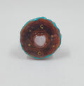 Handcrafted pendant, made out of real pinecone, and added accents of teal, moons, stars and a resin top coat