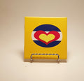 Handcrafted yellow coaster with the Colorado flag made with hearts.