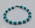 Handcrafted turquoise and clear beaded bracelet